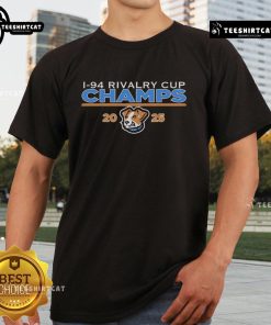 Official I-94 Rivalry Cup Champs 2025 T-Shirt featuring bold graphics and team logos in vibrant colors.