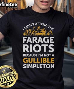 Alt Text: Official 'I Didn't Attend Me Farage Riots Because I'm Not A Gullible Simpleton' T-Shirt design in bold text.