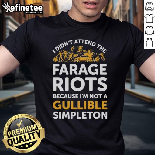 Alt Text: Official 'I Didn't Attend Me Farage Riots Because I'm Not A Gullible Simpleton' T-Shirt design in bold text.