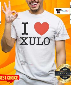 Alt Text: Official I Love Xulo T-Shirt featuring a vibrant design with a heart graphic and bold lettering, perfect for fans.