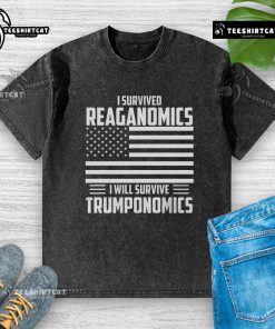 Alt Text: Official I Survived Reaganomics I Will Survive Trumponomics washed t-shirt with bold text design.
