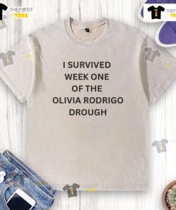 Alt Text: Official I Survived Week One Of The Olivia Rodrigo Drough Washed T-Shirt featuring a stylish design and soft fabric.