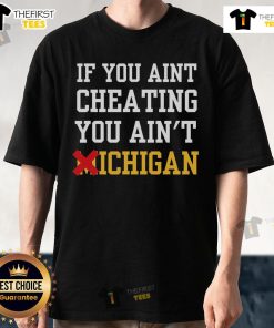 Alt Text: Official If You Ain't Cheating You Ain't Michigan T-Shirt featuring bold text on a stylish design for fans.