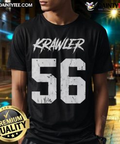 Alt Text: Official Katic Krawlers 56 T-Shirt displayed on a mannequin, showcasing its vibrant design and comfortable fit.