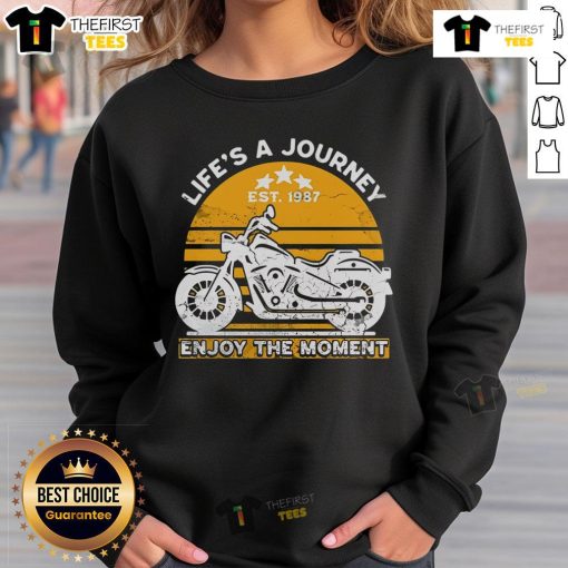Cozy Official Life's A Journey Enjoy The Moment Sweatshirt featuring inspirational text in a stylish design.