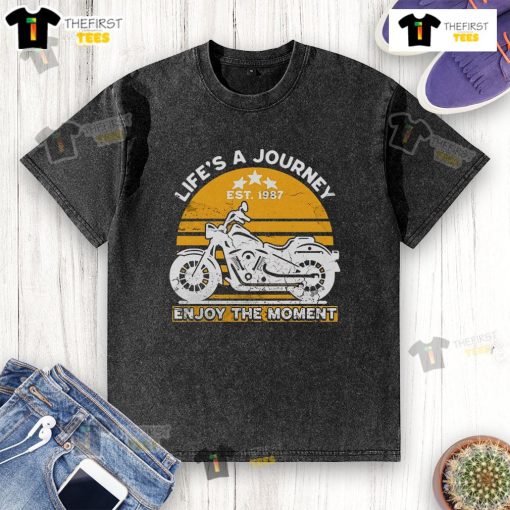Alt Text: Official Life's A Journey Enjoy The Moment washed t-shirt in soft fabric, perfect for casual outings and expressing positivity.