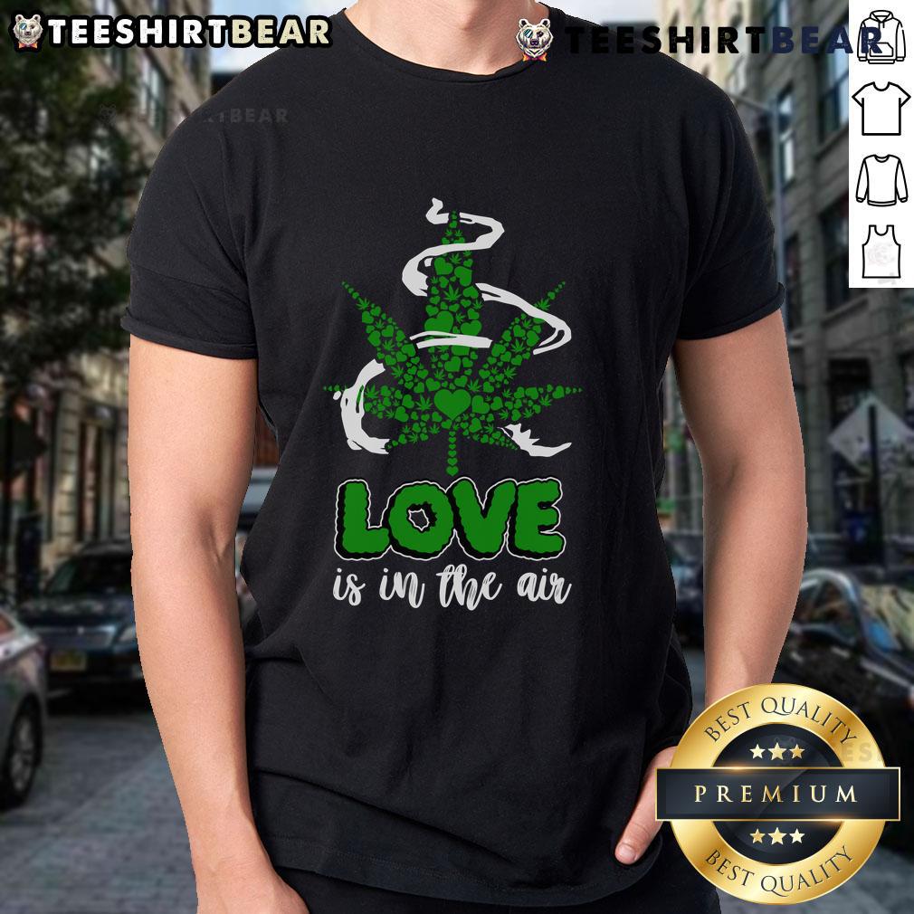 Official Love Is In The Air T Shirt Official Love Is In The Air T-Shirt featuring a stylish heart design, perfect for expressing love and affection.