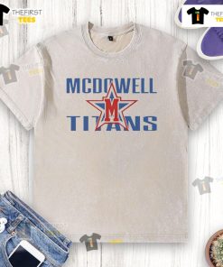 Alt Text: Official McDowell Titans logo on a washed t-shirt, showcasing team spirit and casual style. Perfect for fans!