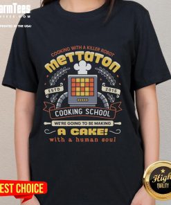 Official Mettaton Cooking School tee featuring a cake with a human soul crest, perfect for fans of Undertale merchandise.