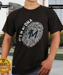 Official Miami Marlins In My DNA T-Shirt featuring team logo and vibrant colors, perfect for fans and casual wear.