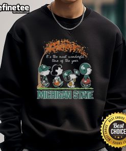 Alt Text: Official Michigan State Spartans Snoopy Peanuts sweatshirt featuring festive design for the holiday season.