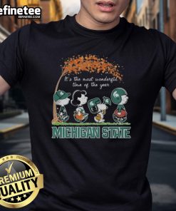 Official Michigan State Spartans Snoopy T-Shirt celebrating the holiday spirit with 'It's The Most Wonderful Time Of The Year' design.