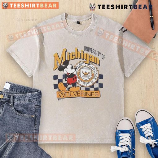 Vintage washed Mickey Mouse University of Michigan Wolverines t-shirt featuring iconic Disney design.