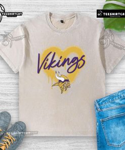 Official Minnesota Vikings Football Spray Heart Washed T-Shirt featuring vibrant team colors and stylish design.