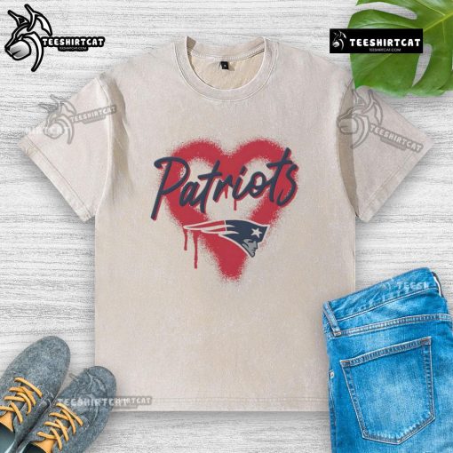 Alt Text: Official New England Patriots Football Spray Heart Washed T-Shirt featuring team colors and logo for fans.