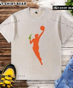 Official New WNBA Logo sex toy meme printed on a washed t-shirt, showcasing humor and sports culture.
