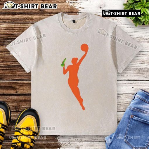 Official New WNBA Logo sex toy meme printed on a washed t-shirt, showcasing humor and sports culture.