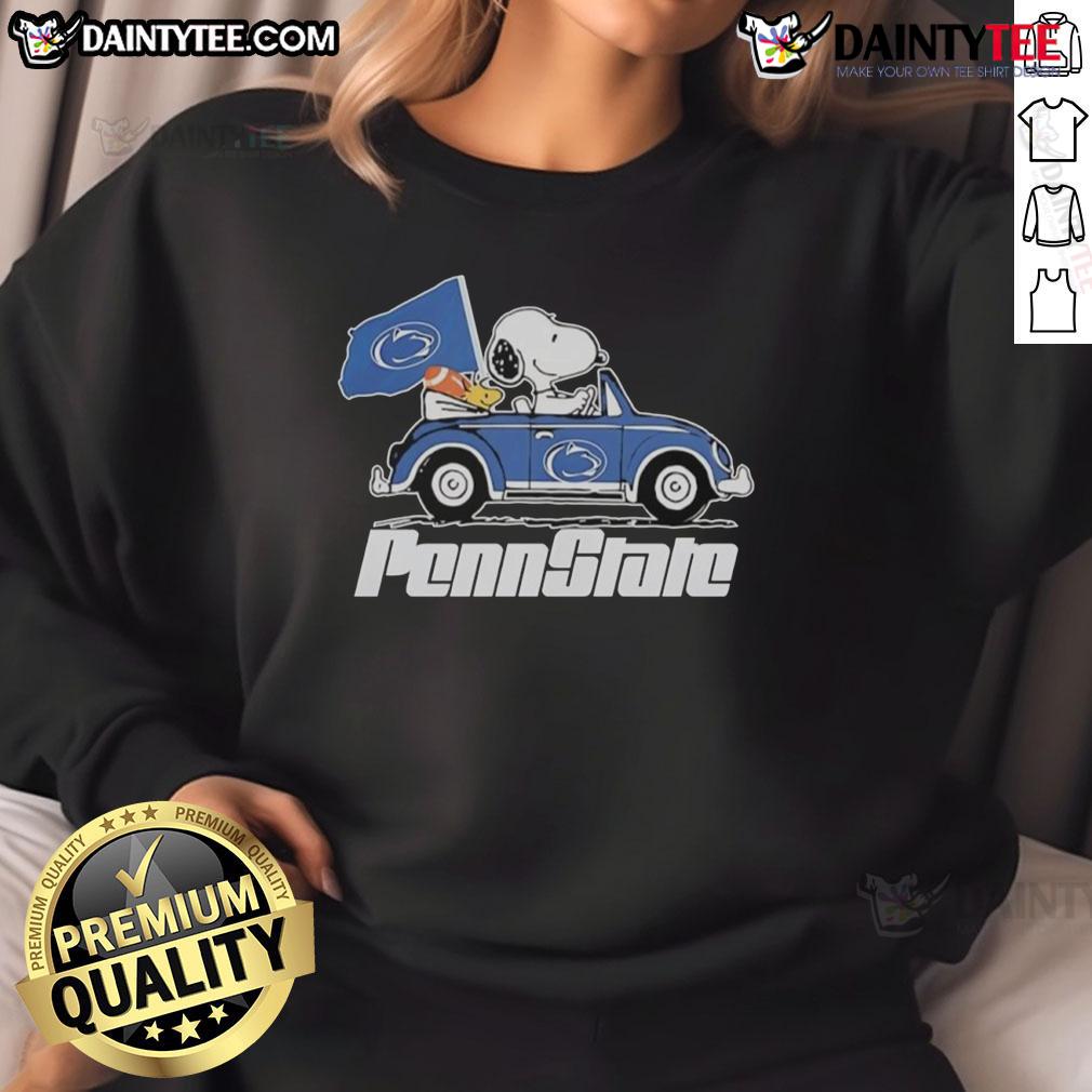 Official Penn State Flag X Snoopy With Woodstock Driving A Car Sweatshirt Alt Text: Official Penn State Flag sweatshirt featuring Snoopy and Woodstock driving a car, perfect for fans and casual wear.