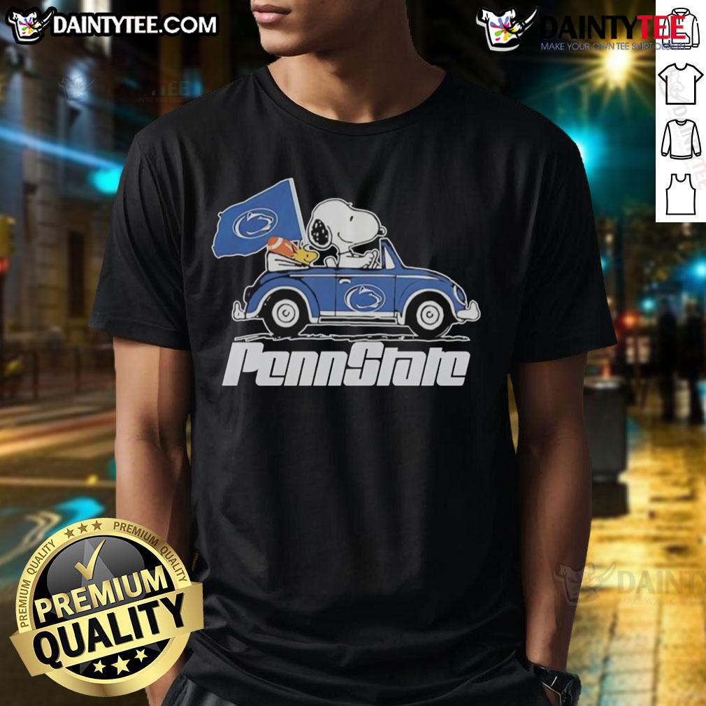 Official Penn State Flag X Snoopy With Woodstock Driving A Car T Shirt Official Penn State flag t-shirt featuring Snoopy and Woodstock driving a car, perfect for Penn State fans.