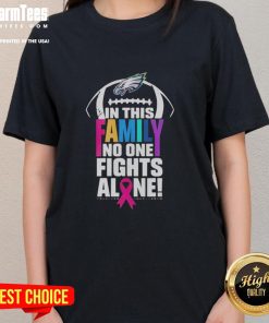 Official Philadelphia Eagles 'In This Family No One Fights Alone' ladies tee featuring team colors and logo.
