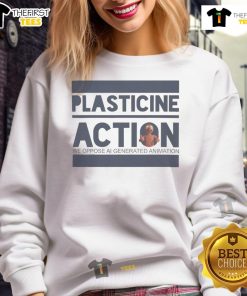 Protester arrested wearing 'Plasticine Action' sweatshirt at a climate demonstration, highlighting environmental activism.