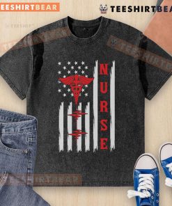 Red nurse caduceus graphic on American flag with ECG heartbeat design on washed t-shirt for healthcare professionals.