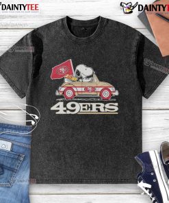 Alt Text: Official San Francisco 49ers x Snoopy with Woodstock driving a car on a washed T-shirt, perfect for fans.