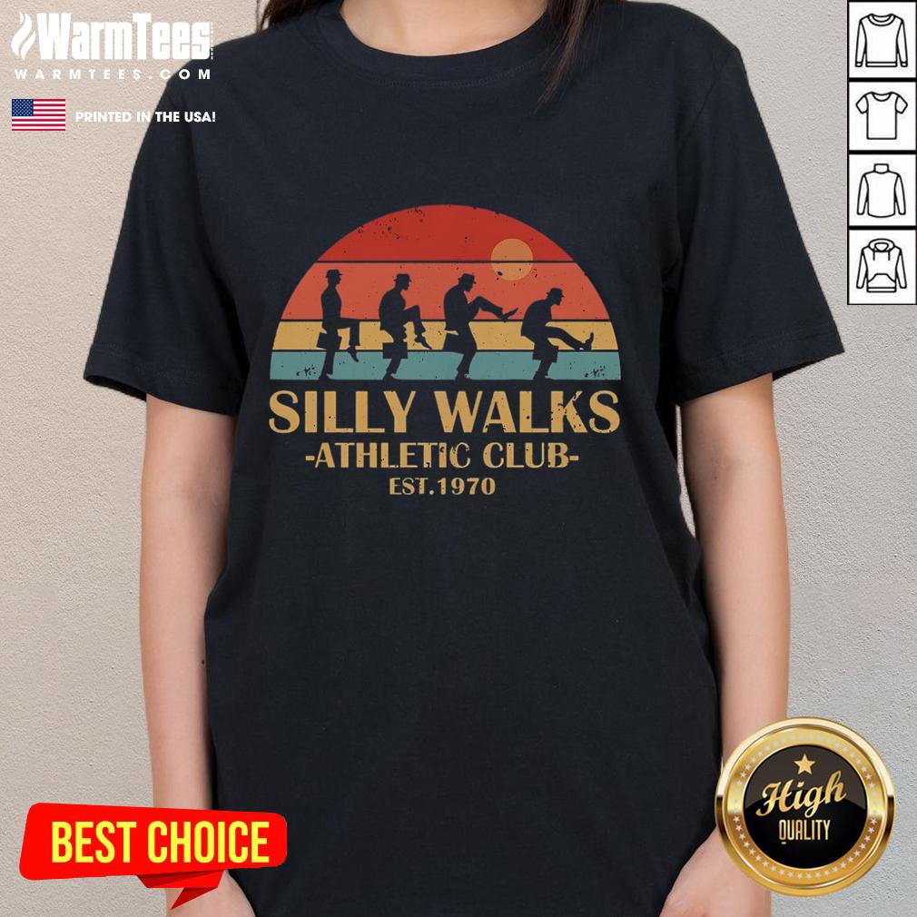 Official Silly Walks Athletic Club Est 1970 Vintage Sunset Ladies Tee Vintage sunset ladies tee from Official Silly Walks Athletic Club, est. 1970, showcasing a playful design and retro style.