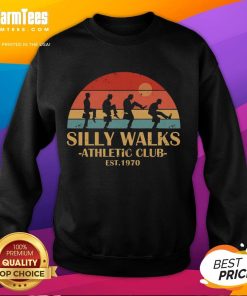 Vintage sunset sweatshirt from Official Silly Walks Athletic Club, est. 1970, showcasing retro style and humor.