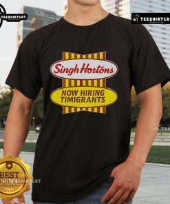 Alt Text: Official Singh Hortons Now Hiring Timigrants logo on a stylish t-shirt, promoting job opportunities for immigrants.