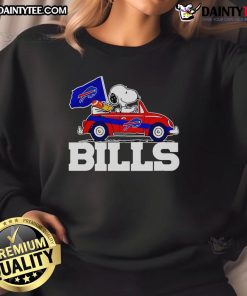 Official Snoopy and Woodstock driving car on Buffalo Bills sweatshirt design, perfect for fans and cozy wear.