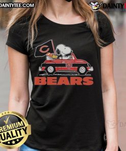 Alt Text: Official Snoopy and Woodstock driving a car on Chicago Bears ladies tee, perfect for fans of Peanuts and NFL.