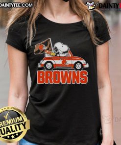 Official Snoopy and Woodstock driving car on Cleveland Browns ladies tee, perfect for fans and casual wear.