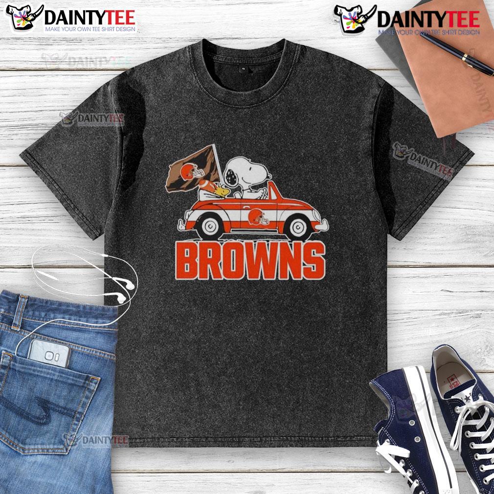 Official Snoopy And Woodstock Driving Car Cleveland Browns Washed T Shirt Alt Text: Official Snoopy and Woodstock driving a car on a Cleveland Browns washed t-shirt, perfect for fans and casual wear.