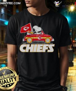 Official Snoopy and Woodstock driving a car on Kansas City Chiefs T-Shirt design for fans and collectors.