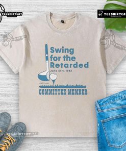 Official Swing For The Retarded Committee Member washed t-shirt featuring a humorous design and vibrant colors.