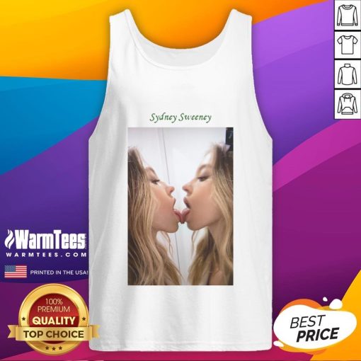 Sydney Sweeney kissing a mirror while wearing a stylish tank top, showcasing her trendy fashion and confident vibe.