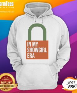 Taylor in my Showgirl era wearing an orange lock hoodie, showcasing vibrant style and confidence in a stunning pose.