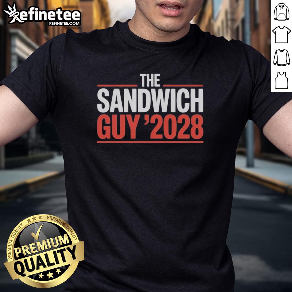 Official The Sandwich Guy 2028 T Shirt Official The Sandwich Guy 2028 T-Shirt featuring a bold logo and vibrant colors, perfect for fans and supporters.