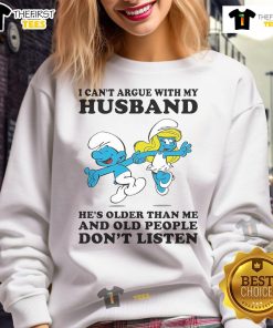 Official The Smurfs I Can't Argue With My Husband He's Older Than Me Sweatshirt featuring fun blue cartoon characters.