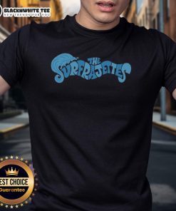 Alt Text: Official The Surfrajettes Wave Logo T-Shirt featuring a vibrant surf-themed design and stylish fit for fans.