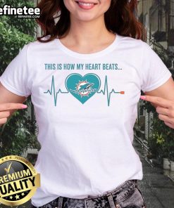 Miami Dolphins ladies tee featuring 'This Is How My Heart Beats' design, perfect for fans and stylish game day wear.