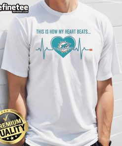 Alt Text: Official Miami Dolphins T-Shirt featuring This Is How My Heart Beats graphic, perfect for fans and game day style.