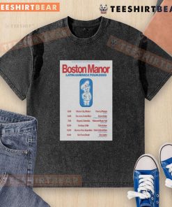 Alt Text: Official Tour Latin America 2025 Boston Manor poster design on a washed t-shirt showcasing vibrant graphics and tour details.