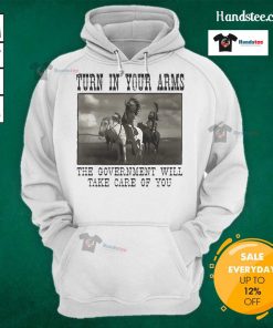 Native American hoodie featuring 'Turn In Your Arms, The Government Will Take Care Of You' message for cultural awareness.