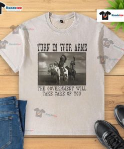 Official Turn In Your Arms T-Shirt featuring Native American design, highlighting government support and care.