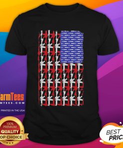 Alt Text: Official USA Guns and Bullets Flag T-Shirt featuring patriotic design with firearm graphics and vibrant colors.