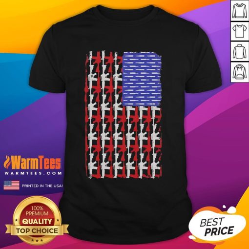 Alt Text: Official USA Guns and Bullets Flag T-Shirt featuring patriotic design with firearm graphics and vibrant colors.