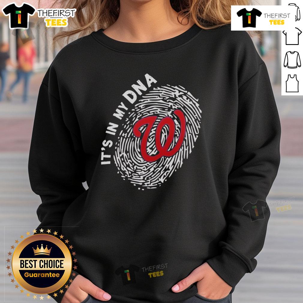Official Washington Nationals In My Dna Sweatshirt Alt Text: Official Washington Nationals In My DNA sweatshirt displayed on a hanger, showcasing team pride and stylish design.