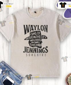 Alt Text: Official Waylon Jennings Songbird Cowboy Washed T-Shirt featuring a vintage design and soft fabric for music fans.